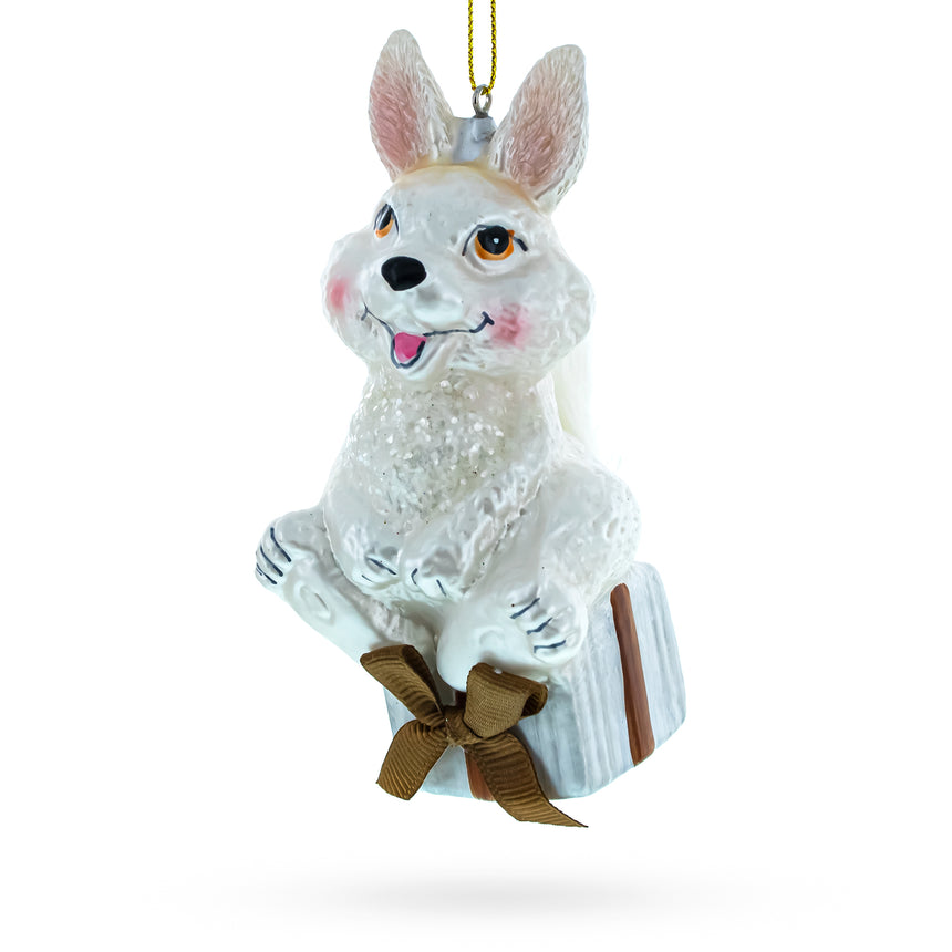 Glass Bunny Elegantly Perched on a Festive Gift Box Blown Glass Christmas Ornament in White color