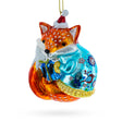 Glass Whimsical Fox with Gifts Blown Glass Christmas Ornament in Multi color