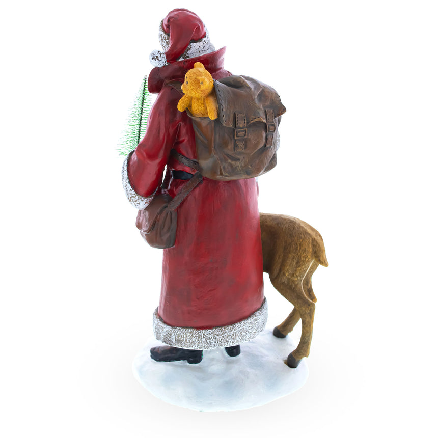 Shop Santa Holding Christmas Tree and Bell by Reindeer Figurine 12 Inches. Buy Christmas Decor Figurines Santa AL Red  Resin for Sale by Online Gift Shop BestPysanky Santa Claus figurine decoration