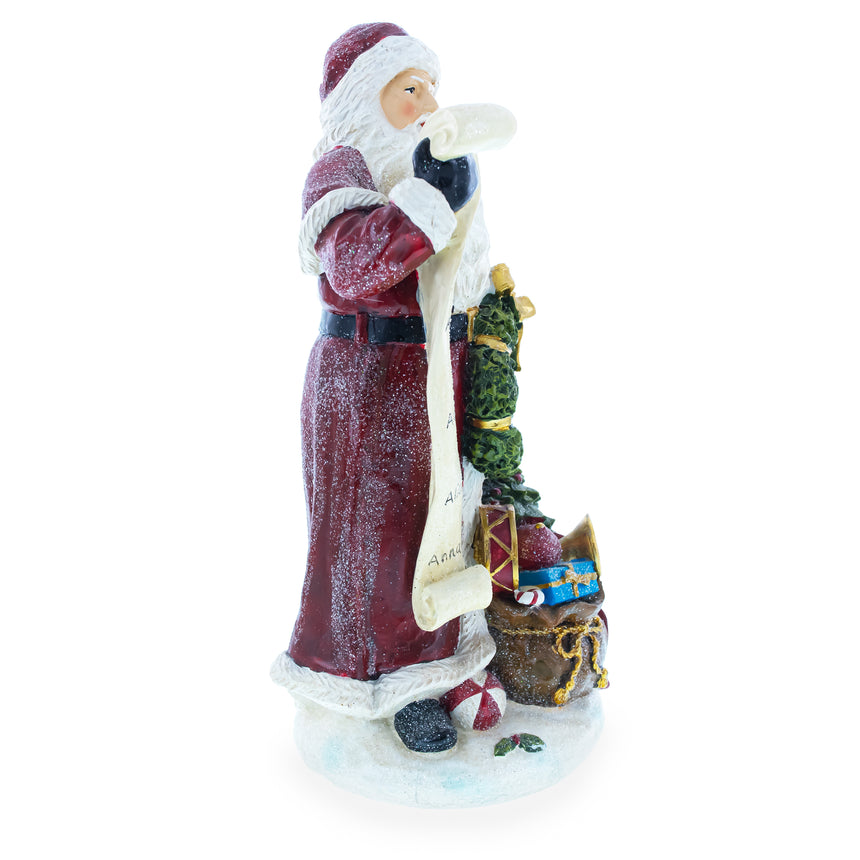 Shop Santa Reading the Christmas Gifts List Figurine 11.5 Inches. Buy Christmas Decor Figurines Santa AL Red  Resin for Sale by Online Gift Shop BestPysanky Santa Claus figurine decoration