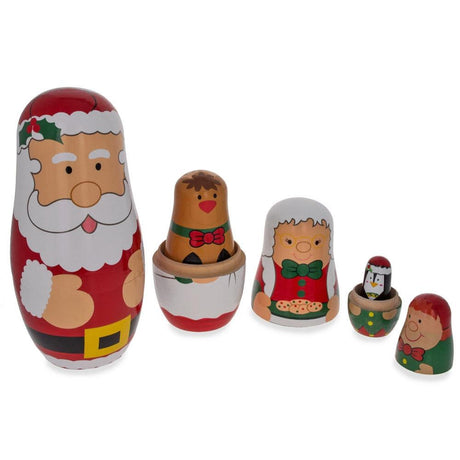 Shop Santa Claus, Mrs. Claus, Reindeer, Elf Wooden Nesting Dolls 6 Inches. Buy Nesting Dolls Santa Red  Wood for Sale by Online Gift Shop BestPysanky stackable matryoshka stacking toy babushka Russian authentic for kids little Christmas nested matreshka wood hand painted collectible figurine figure statuette