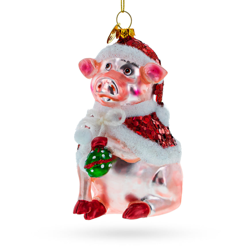 Glass Pig Donning a Santa Hat Blown Glass Christmas Ornament in Pink color