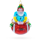 Glass Santa Football Player with Sports Ball Blown Glass Christmas Ornament in Multi color