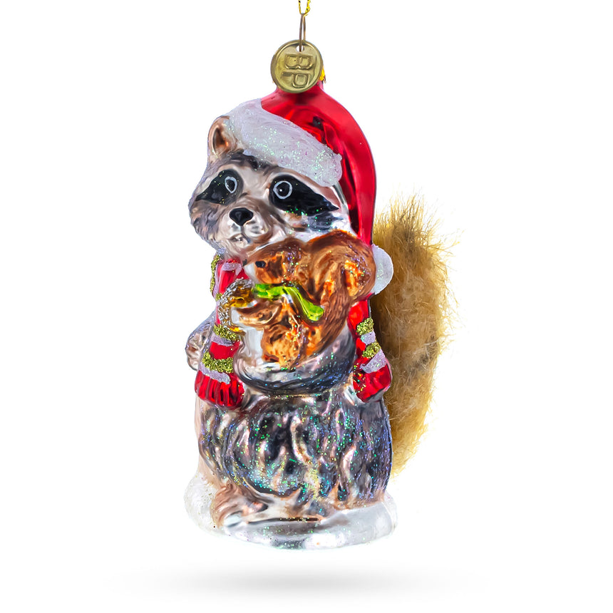 Glass Raccoon Holding Squirrel Blown Glass Christmas Ornament in Gray color