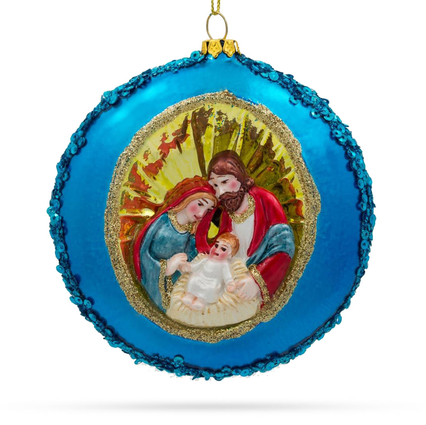 Glass Serene Holy Family on Purple Disc Glass Christmas Ornament in Blue color Disc