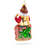 Santa Enjoying Whiskey Time Blown Glass Christmas Ornament ,dimensions in inches: 5.4 x 2.8 x