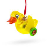 Glass Yellow Duck Rolling on Wheels Blown Glass Christmas Ornament in Yellow color