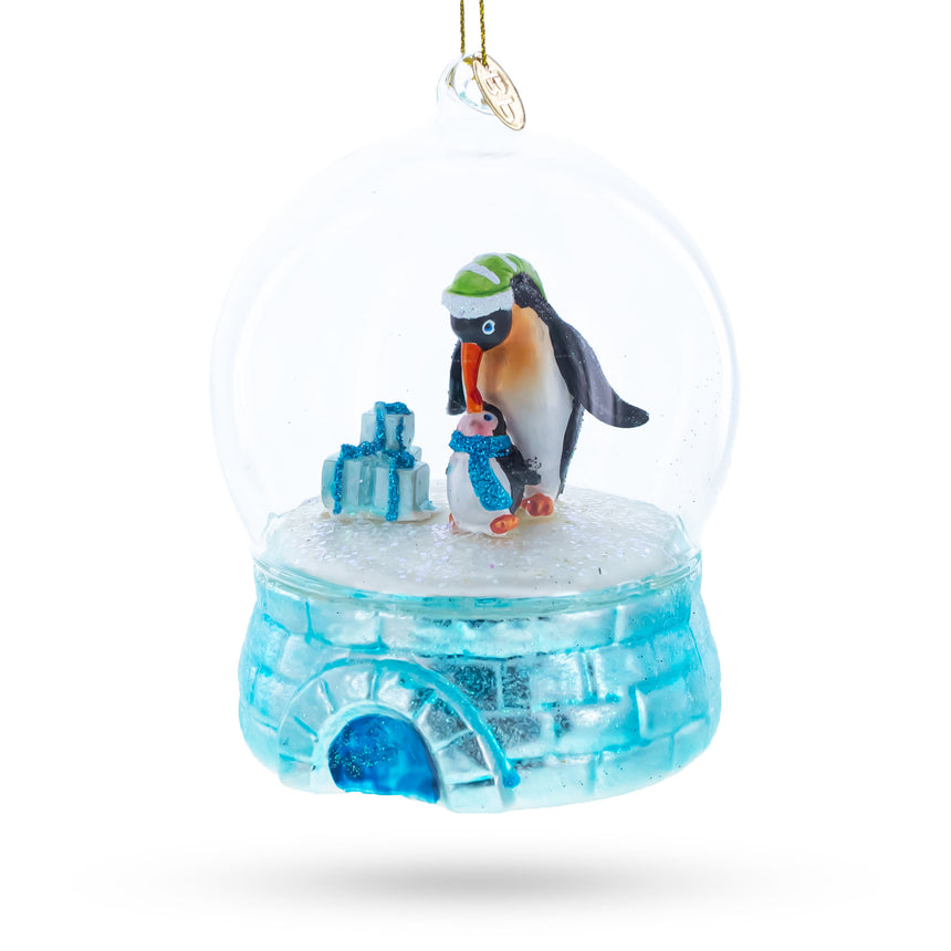 Glass Penguins in the Igloo Dome Blown Glass Christmas Ornament in White color