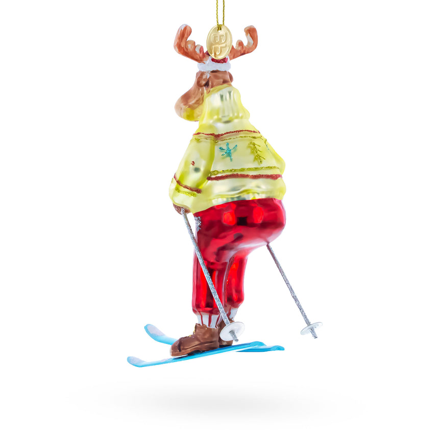 Festive Reindeer Skiing Blown Glass Christmas Ornament ,dimensions in inches: 6.5 x 3.94 x 3.08