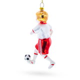 Sporty Girl Playing Soccer Blown Glass Christmas Ornament ,dimensions in inches: 5 x 1.9 x 1.3