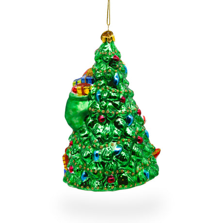 Jolly Santa by Tree Blown Glass Christmas Ornament ,dimensions in inches: 6 x 3.9 x 3.6