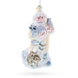 Glass Santa Holding Cardinal and Raccoon Glass Christmas Ornament in White color