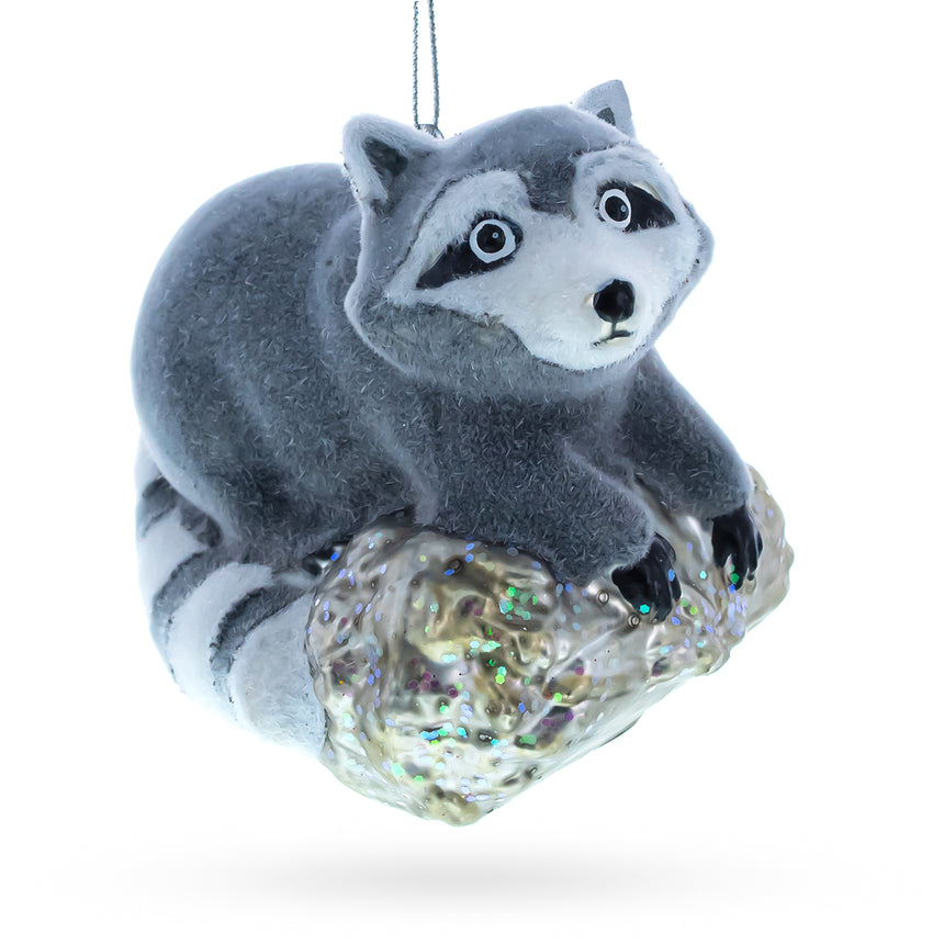 Glass Playful Racoon on a Log Blown Glass Christmas Ornament in Gray color