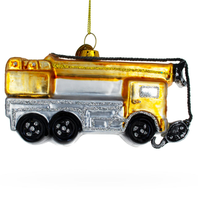 Glass Vibrant Yellow Construction Crane Glass Christmas Ornament in Yellow color