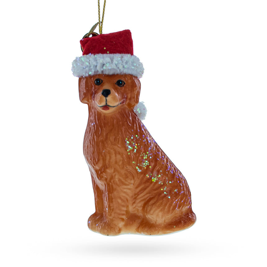 Glass Golden Retriever in a Santa Hat Glass Christmas Ornament in Gold color