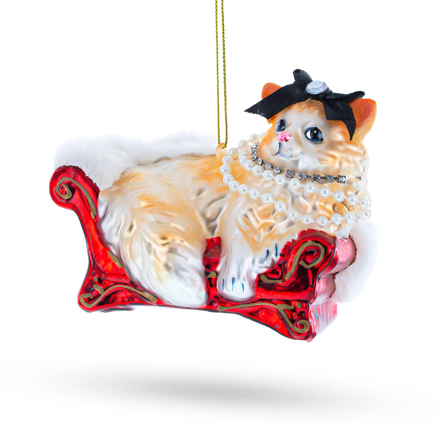 Glass Cat in Pearl Necklace Lounging on Luxurious Sofa Blown Glass Christmas Ornament in Beige color