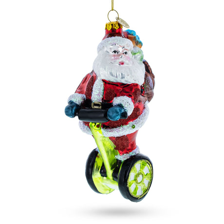 Glass Santa Cruising on Electric Scooter Glass Christmas Ornament in Multi color