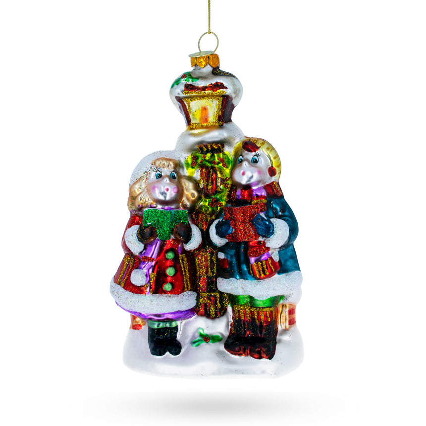 Glass Carolers by a Vintage Lantern Blown Glass Christmas Ornament in Multi color