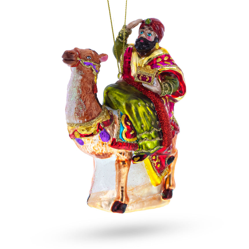 Glass Majestic Wiseman Riding a Camel Glass Christmas Ornament in Multi color