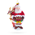 Glass Santa's Sleigh Ride: Santa with Reindeer Blown Glass Christmas Ornament in Red color