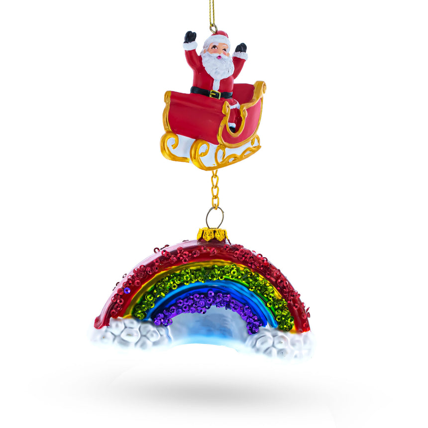 Glass Whimsical Santa in Sleigh Over Rainbow Blown Glass Christmas Ornament in Multi color