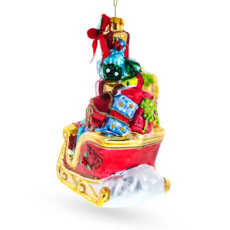 Sleigh Full of Gifts Blown Glass Christmas Ornament ,dimensions in inches: 6.5 x 4.6 x 2.7