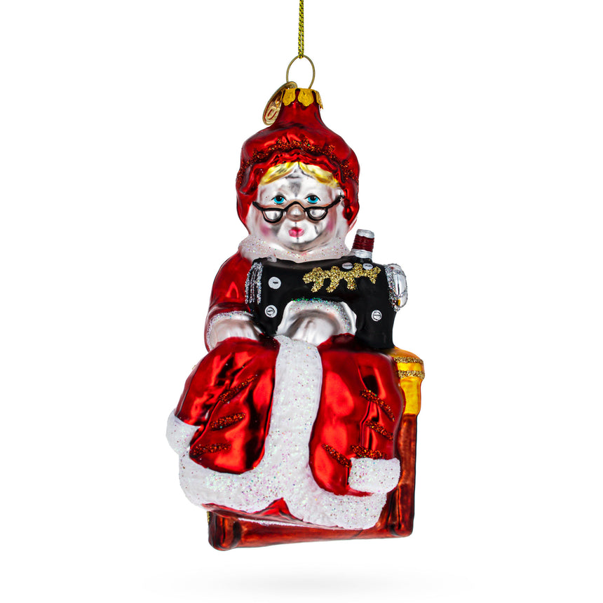 Glass Diligent Mrs. Claus and Sewing Machine Blown Glass Christmas Ornament in Red color