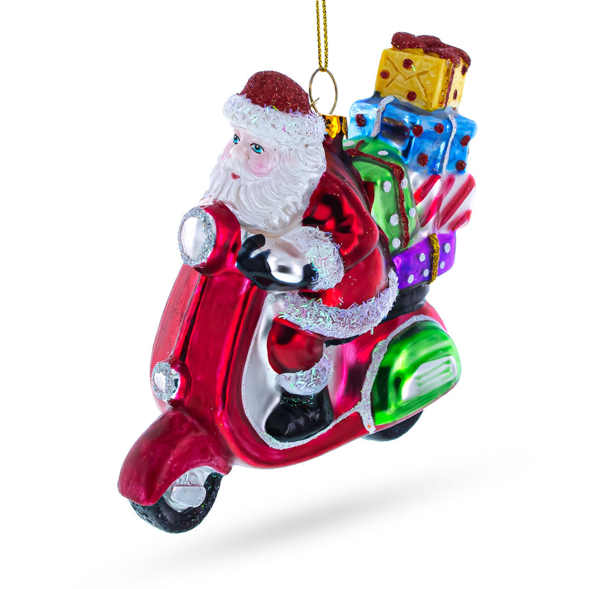 Glass Santa Whizzing by on a Scooter with a Sack of Gifts Glass Christmas Ornament in Multi color