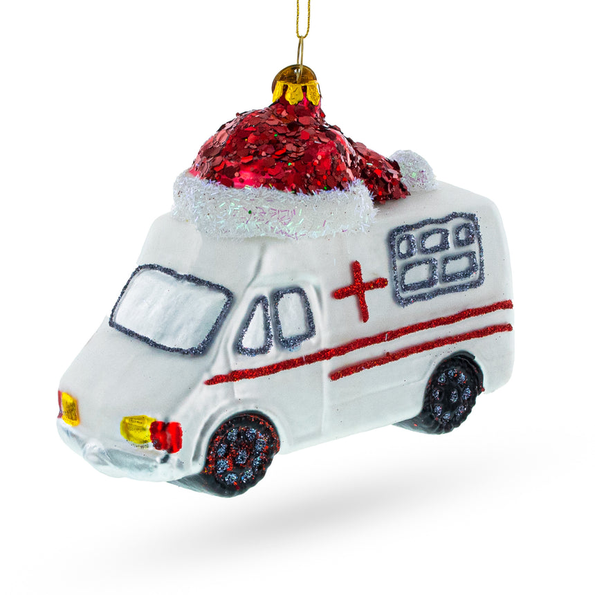 Glass Festive Ambulance in a Santa Hat Glass Christmas Ornament in White color