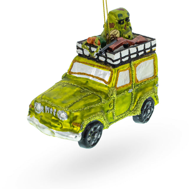 Glass Camouflaged Hunter in a Car Blown Glass Christmas Ornament in Green color