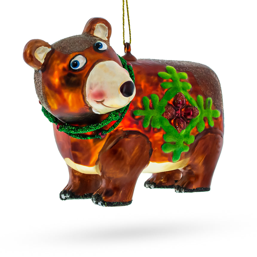 Glass Brown Bear Holding a Poinsettia Glass Christmas Ornament in Brown color