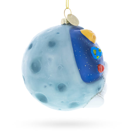 Astronaut on a Moon Blown Glass Christmas Ornament ,dimensions in inches: 3.8 x 3.5 x 3.3