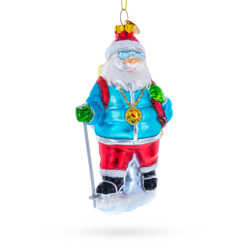 Snowshoeing Santa Blown Glass Christmas Ornament ,dimensions in inches: 5.5 x 3.4 x 2.7