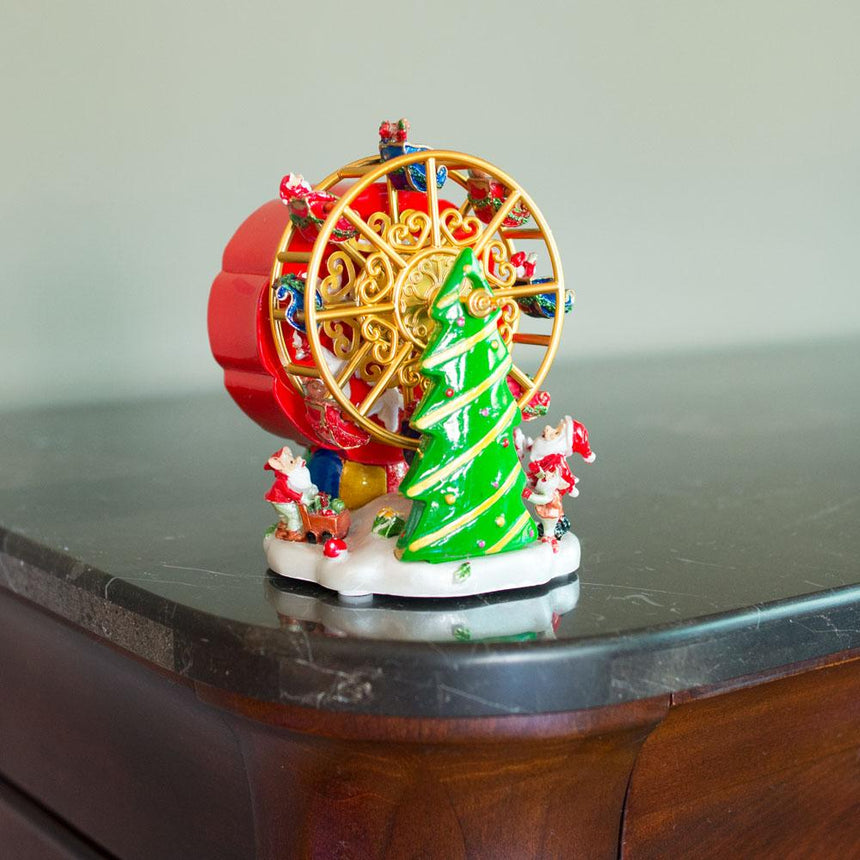 Santa's Ferris Wheel Festivity: Spinning Musical Figurine with Christmas Tree