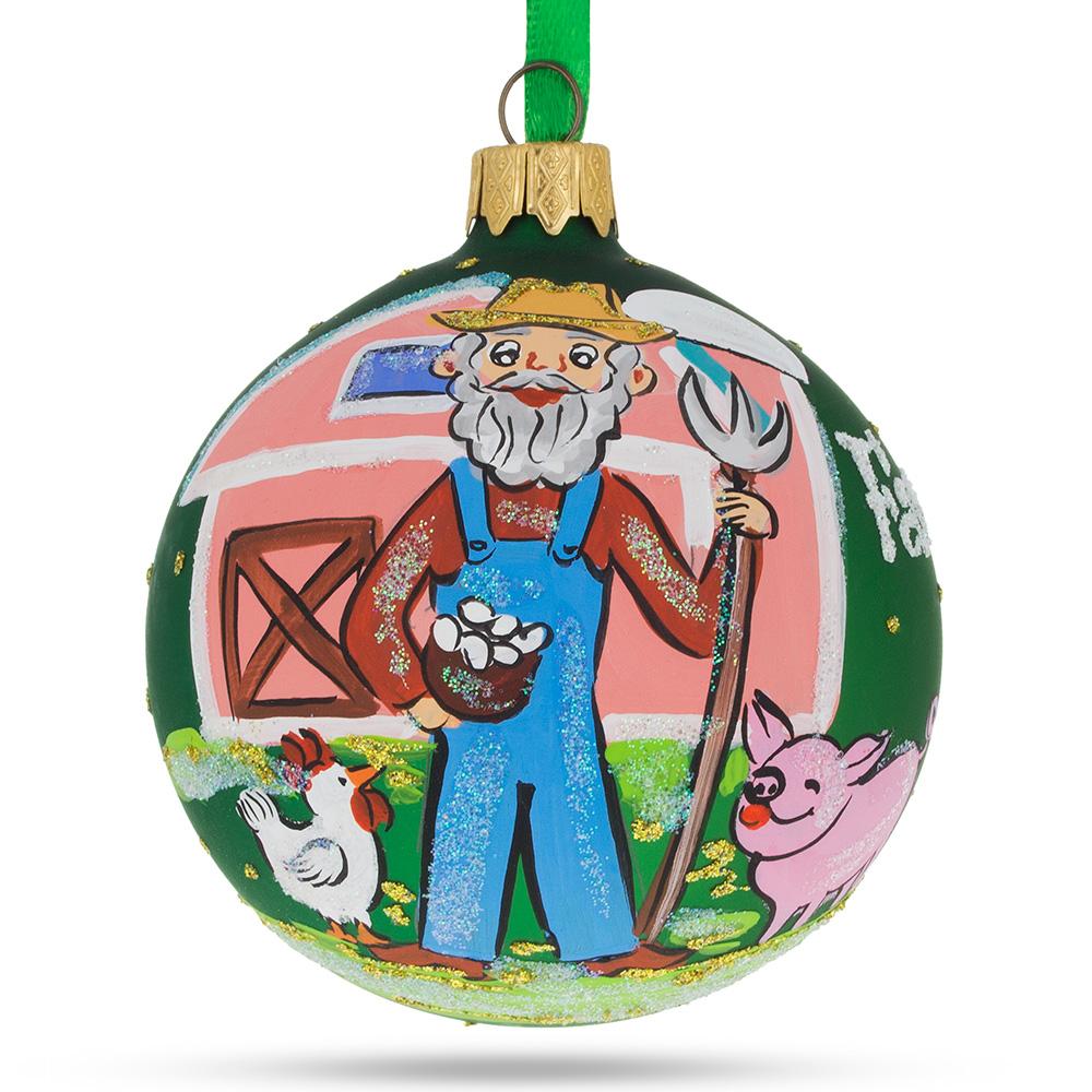 Glass Farmer by the Barn Blown Glass Ball Christmas Ornament 3.25 Inches in Green color Round