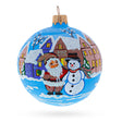 Glass Santa & Snowman Winter Village Scene Glass Ball Christmas Ornament 3.25 Inches in Multi color Round