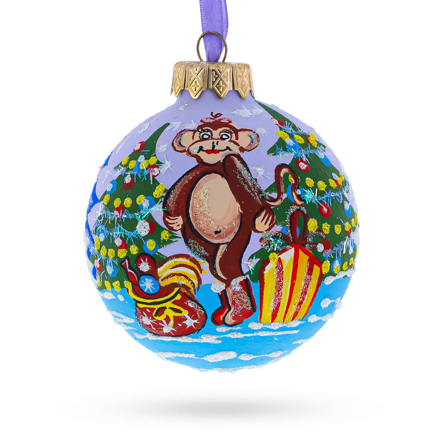 Glass Monkey with Christmas Tree and Gifts Blown Glass Ball Christmas Ornament 3.25 Inches in Multi color Round