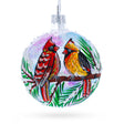 Glass Two Cardinals in Snowy Scenery Glass Ball Christmas Ornament 3.25 Inches in Multi color Round