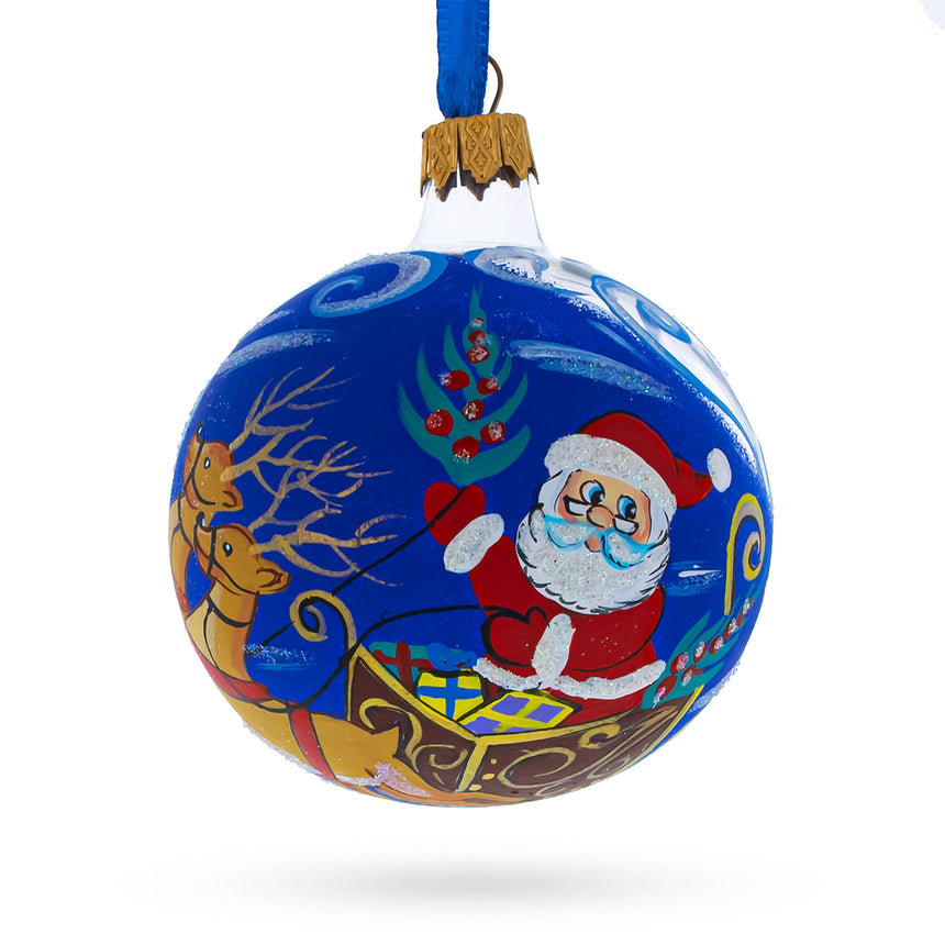 Glass Jolly Santa Riding Sleigh with Reindeer Glass Ball Christmas Ornament 3.25 Inches in Blue color Round