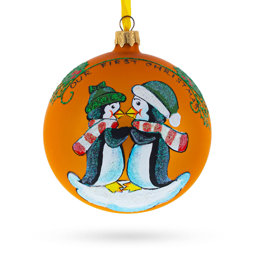 Glass Penguin Couple Blown Glass Ball 'Our First Christmas' Ornament 4 Inches in Orange color Round