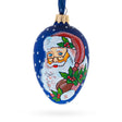 Glass Santa With Mistletoe Glass Egg Ornament 4 Inches in Blue color Oval