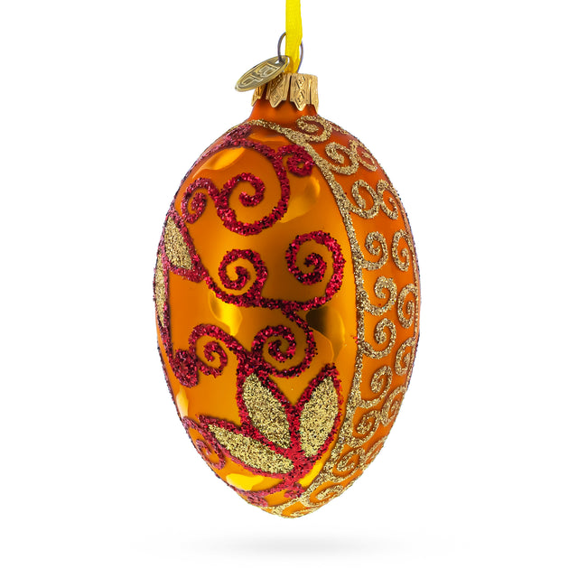 Glass Autumn Leaves on Gold Glass Egg Christmas Ornament 4 Inches in Orange color Oval