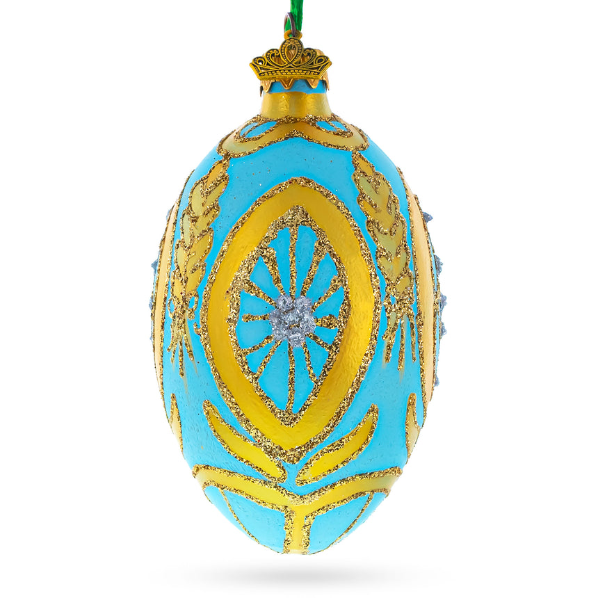 Glass Golden Wheat on Turquoise Glass Egg Christmas Ornament 4 Inches in Blue color Oval