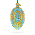 Glass Golden Wheat on Turquoise Glass Egg Christmas Ornament 4 Inches in Blue color Oval