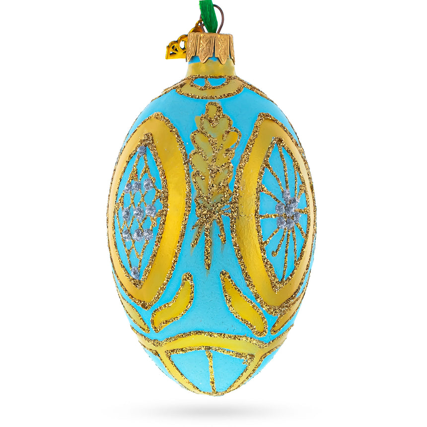 Glass Golden Wheat on Turquoise Glass Egg Christmas Ornament 4 Inches in Blue color Oval