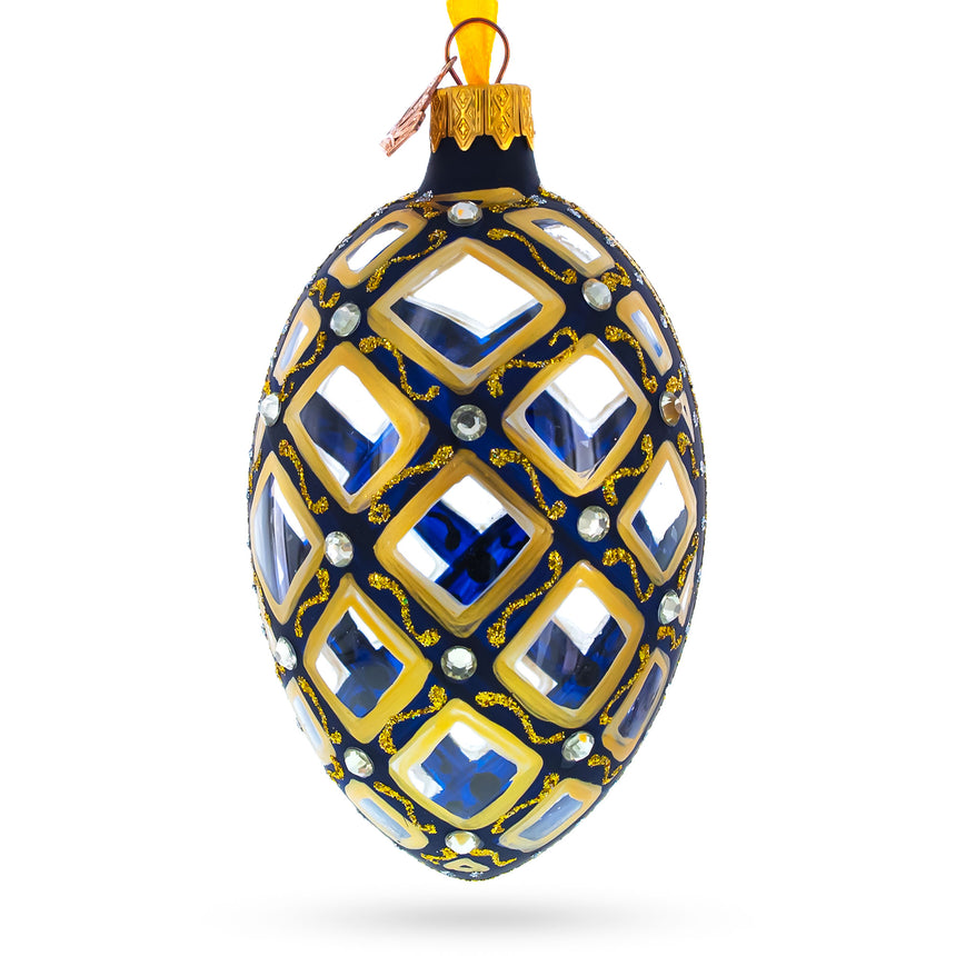 Glass Mosaic Pattern on Blue Glass Egg Ornament 4 Inches in Multi color Oval