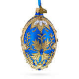 Glass Golden Swirls on Blue Glass Egg Ornament 4 Inches in Blue color Oval