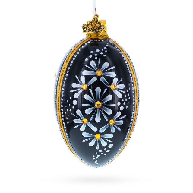 Glass Daisy Motif with Golden Accents and Crystals Glass Egg Ornament in Black color Oval