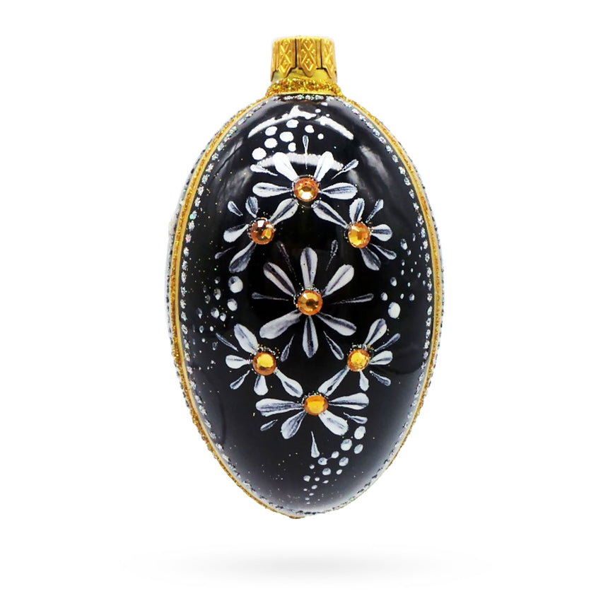 Glass Daisy Motif with Golden Accents and Crystals Glass Egg Ornament in Black color Oval