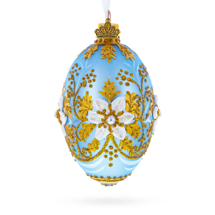 Glass Blue and Gold Embossed Floral Glass Egg Ornament in Blue color Oval